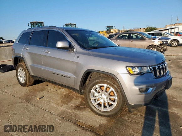 2021 Jeep Grand Cherokee Laredo E with VIN 1C4RJFAG1MC817601, listed as a Copart auction lot 56421195 with 91,292 mi miles and Salvage title. Bid and sale history available at DreamBid. Image 4.
