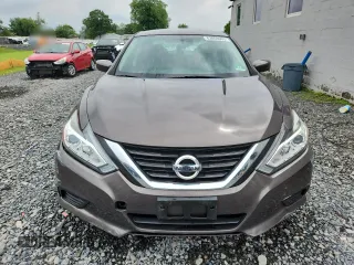 2016 Nissan Altima S with VIN 1N4AL3AP8GN313633, listed as a Copart auction lot 63068905 with 69,850 mi miles and Salvage title. Bid and sale history available at DreamBid. Image 5.