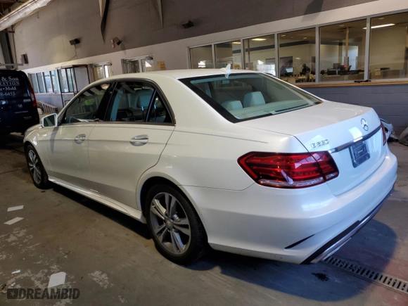 2015 Mercedes-Benz E-Class E 250 BlueTEC Luxury with VIN WDDHF0EB0FB089213, listed as a Copart auction lot 37906993 with 105,953 mi miles. Bid and sale history available at carsss.com. Image 2.