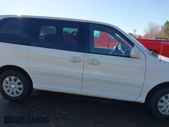 2005 Kia Sedona LX with VIN KNDUP132956703200, listed as a IAAI auction lot 41700159 with 125,578 mi miles. Bid and sale history available at carsss.com. Image 13.