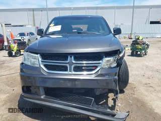 2015 Dodge Journey American Value z VIN 3C4PDCAB2FT637391, wystawiony jako IAAI lot #42354094 z przebiegiem 130 743 mil mil oraz . Historia ofert i sprzedaży dostępna na DreamBid. Obrazek 12.