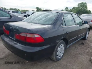 1999 Honda Accord LX z VIN JHMCG564XXC007996, wystawiony jako IAAI lot #42228809 z przebiegiem 342 104 mil mil oraz . Historia ofert i sprzedaży dostępna na DreamBid. Obrazek 4.