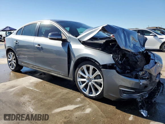 2017 Volvo S60 Inscription z VIN LYV402HK2HB150225, wystawiony jako Copart lot #80588184 z przebiegiem 53 910 mil mil oraz Szkoda całkowita • Salvage title. Historia ofert i sprzedaży dostępna na DreamBid. Obrazek 4.