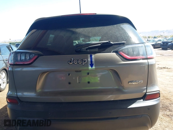 2021 Jeep Cherokee Altitude with VIN 1C4PJLLBXMD155096, listed as a IAAI auction lot 41746319 with 99,423 mi miles and . Bid and sale history available at DreamBid. Image 17.