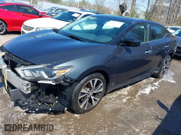 2016 Nissan Maxima SR with VIN 1N4AA6AP4GC419032, listed as a IAAI auction lot 41887138 with 164,208 mi miles and . Bid and sale history available at DreamBid. Image 2.