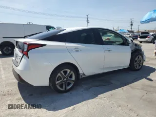 2022 Toyota Prius L Eco z VIN JTDKAMFU2N3176948, wystawiony jako Copart lot #52086435 z przebiegiem 140 633 mil mil oraz Szkoda całkowita • Salvage title. Historia ofert i sprzedaży dostępna na DreamBid. Obrazek 3.