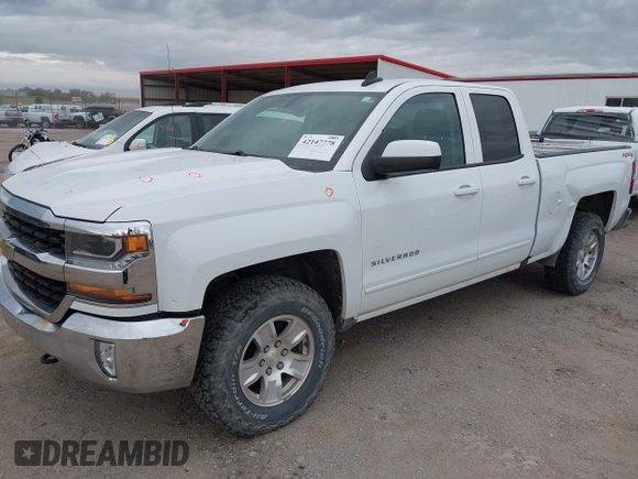2016 Chevrolet Silverado 1500 LT with VIN 1GCVKREC7GZ338959, listed as a IAAI auction lot 42147778 with 140,570 mi miles and . Bid and sale history available at DreamBid. Image 2.
