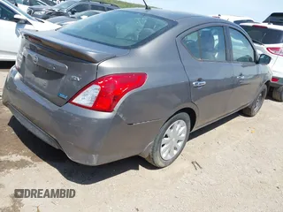 2016 Nissan Versa SV with VIN 3N1CN7AP3GL869789, listed as a IAAI auction lot 41997640 with 208,817 mi miles and . Bid and sale history available at DreamBid. Image 4.