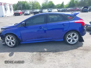 2014 Ford Focus ST z VIN 1FADP3L98EL154282, wystawiony jako IAAI lot #42290203 z przebiegiem 104 927 mil mil oraz . Historia ofert i sprzedaży dostępna na DreamBid. Obrazek 14.