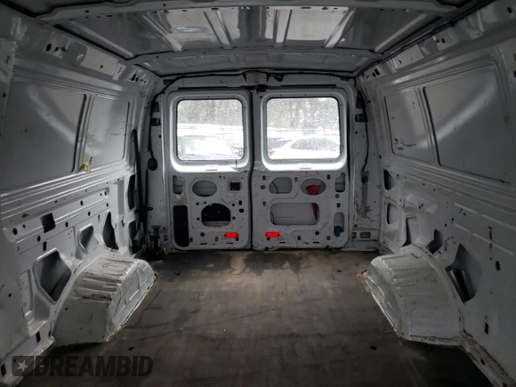 2013 Ford Econoline Cargo Commercial с VIN 1FTNE2EW8DDB03942, выставлен на аукционе Copart как лот 81302434 с пробегом 126 461 миль миль и Списание • Salvage title. История ставок и продаж доступна на DreamBid. Изображение 10.
