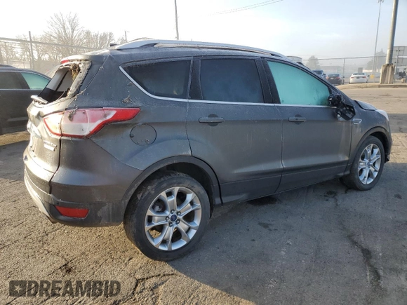 2015 Ford Escape Titanium with VIN 1FMCU0J99FUA26849, listed as a Copart auction lot 50583825 with Not provided miles and Salvage title. Bid and sale history available at DreamBid. Image 3.