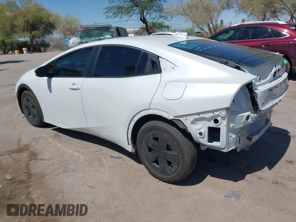 2024 Toyota Prius LE with VIN JTDACAAU5R3046244, listed as a IAAI auction lot 42464523 with 13,590 mi miles and . Bid and sale history available at DreamBid. Image 3.