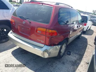 1998 Toyota Sienna LE with VIN 4T3ZF13C2WU049089, listed as a IAAI auction lot 41887109 with 323,601 mi miles and . Bid and sale history available at DreamBid. Image 4.