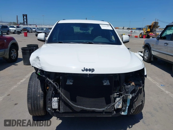 2018 Jeep Grand Cherokee Altitude with VIN 1C4RJEAG2JC404009, listed as a IAAI auction lot 42691304 with 60,948 mi miles and . Bid and sale history available at DreamBid. Image 13.