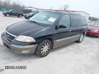 2001 Ford Windstar LTD with VIN 2FMDA58451BB03770, listed as a IAAI auction lot 42019738 with 209,452 mi miles and . Bid and sale history available at carsss.com. Image 2.