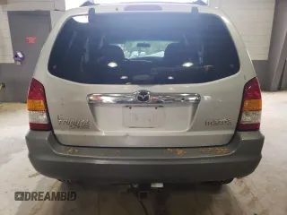 2001 Mazda Tribute LX with VIN 4F2CU08141KM65160, listed as a Copart auction lot 60895624 with 255,194 mi miles and Salvage Title. Bid and sale history available at carsss.com. Image 6.
