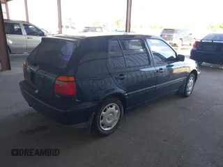 1997 Volkswagen Golf z VIN 3VWFA81H3VM089008, wystawiony jako IAAI lot #41821504 z przebiegiem 118 715 mil mil oraz . Historia ofert i sprzedaży dostępna na DreamBid. Obrazek 4.