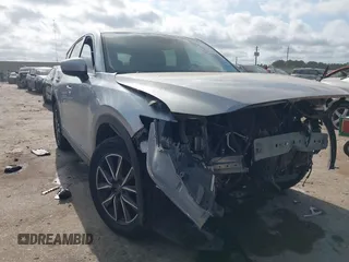 2018 Mazda CX-5 Grand Touring with VIN JM3KFADM6J0325626, listed as a IAAI auction lot 42054702 with 121,952 mi miles and . Bid and sale history available at DreamBid. Image 1.