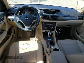 2014 BMW X1 sDrive28i z VIN WBAVM1C51EVW51832, wystawiony jako Copart lot #60153925 z przebiegiem 101 781 mil mil oraz Szkoda całkowita • Salvage title. Historia ofert i sprzedaży dostępna na DreamBid. Obrazek 8.