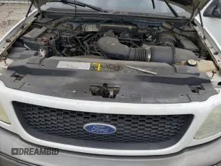 2003 Ford F-150 XL z VIN 2FTRX18L93CA55860, wystawiony jako Copart lot #57402295 z przebiegiem 312 879 mil mil oraz Szkoda całkowita • Salvage title. Historia ofert i sprzedaży dostępna na DreamBid. Obrazek 11.