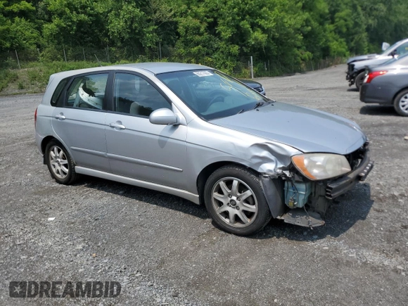 2005 Kia Spectra z VIN KNAFE162755170129, wystawiony jako Copart lot #60217065 z przebiegiem 94 458 mil mil oraz Szkoda całkowita • Salvage title. Historia ofert i sprzedaży dostępna na DreamBid. Obrazek 4.
