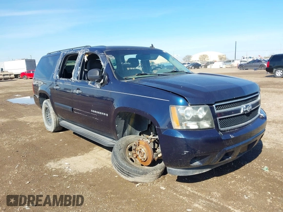 2009 Chevrolet Suburban LS z VIN 1GNFC16029R200974, wystawiony jako IAAI lot #41370873 z przebiegiem 207 649 mil mil oraz . Historia ofert i sprzedaży dostępna na DreamBid. Obrazek 1.