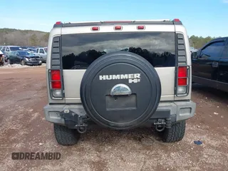2005 Hummer H2 SUV with VIN 5GRGN23U65H101545, listed as a IAAI auction lot 41426274 with 293,821 mi miles. Bid and sale history available at carsss.com. Image 16.