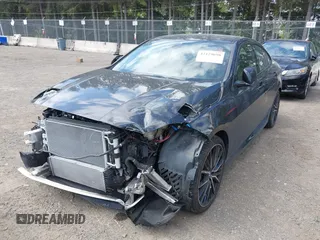 2020 BMW 2 Series 228i xDrive with VIN WBA73AK00L7F77132, listed as a IAAI auction lot 42129698 with 27,989 mi miles and . Bid and sale history available at DreamBid. Image 18.