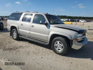 2004 Chevrolet Suburban LT with VIN 1GNFK16Z94J291458, listed as a Copart auction lot 73242864 with 151,676 mi miles and Salvage Title. Bid and sale history available at carsss.com. Image 4.