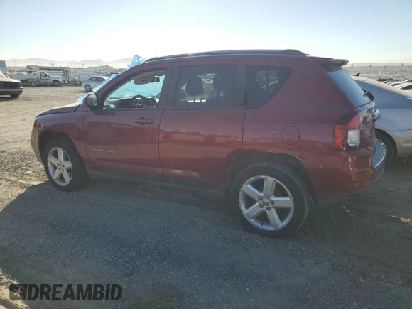 2014 Jeep Compass Latitude with VIN 1C4NJCEA0ED849678, listed as a Copart auction lot 41357425 with 60,828 mi miles and Salvage Title. Bid and sale history available at carsss.com. Image 2.