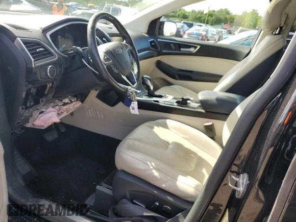 2015 Ford Edge Titanium z VIN 2FMTK4K86FBB88124, wystawiony jako Copart lot #57392305 z przebiegiem 95 698 mil mil oraz Szkoda całkowita • Salvage title. Historia ofert i sprzedaży dostępna na DreamBid. Obrazek 7.