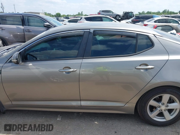 2015 Kia Optima LX with VIN 5XXGM4A71FG423232, listed as a IAAI auction lot 42054131 with 135,213 mi miles. Bid and sale history available at carsss.com. Image 14.