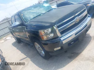 2011 Chevrolet Silverado 1500 LT with VIN 3GCPCSE06BG391860, listed as a IAAI auction lot 42077801 with 214,709 mi miles. Bid and sale history available at carsss.com. Image 1.