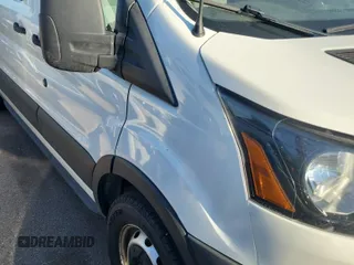 2019 Ford Transit z VIN 1FTYR2CG7KKA96911, wystawiony jako IAAI lot #42566551 z przebiegiem 207 807 mil mil oraz . Historia ofert i sprzedaży dostępna na DreamBid. Obrazek 42.