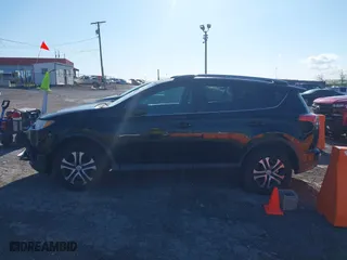 2017 Toyota RAV4 LE with VIN 2T3BFREV6HW579227, listed as a IAAI auction lot 42001564 with 150,431 mi miles. Bid and sale history available at carsss.com. Image 14.
