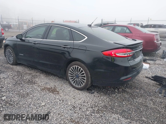 2018 Ford Fusion Titanium with VIN 3FA6P0RU7JR182119, listed as a IAAI auction lot 41984816 with 146,748 mi miles and . Bid and sale history available at DreamBid. Image 3.