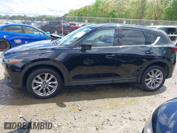 2019 Mazda CX-5 Grand Touring with VIN JM3KFBDM7K0518603, listed as a IAAI auction lot 39185478 with 42,805 mi miles. Bid and sale history available at carsss.com. Image 6.