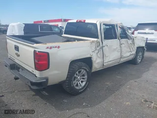 2014 Chevrolet Silverado 1500 LTZ with VIN 3GCUKSEC8EG287942, listed as a IAAI auction lot 41824171 with 205,607 mi miles. Bid and sale history available at carsss.com. Image 4.