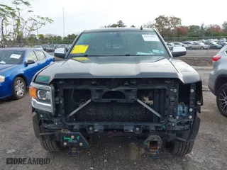 2014 GMC Sierra 1500 SLT with VIN 1GTV2VEJXEZ389280, listed as a IAAI auction lot 41370436 with 124,311 mi miles. Bid and sale history available at carsss.com. Image 12.