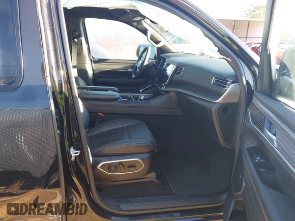2023 Jeep Wagoneer Series II with VIN 1C4SJSBP1PS557378, listed as a IAAI auction lot 41806493 with 68,806 mi miles and . Bid and sale history available at DreamBid. Image 5.