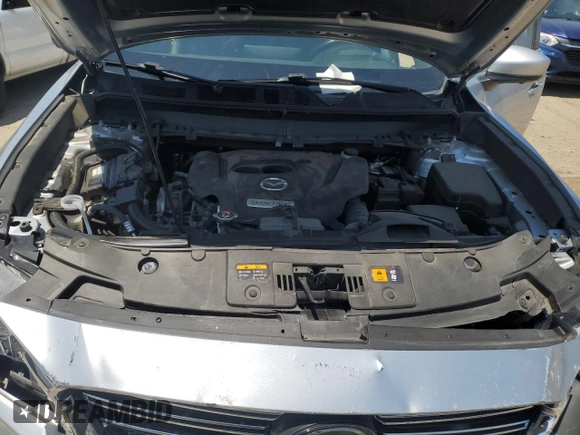 2021 Mazda CX-9 Grand Touring z VIN JM3TCADY4M0512268, wystawiony jako Copart lot #62683464 z przebiegiem Nie podano mil oraz Szkoda całkowita • Salvage title. Historia ofert i sprzedaży dostępna na DreamBid. Obrazek 11.