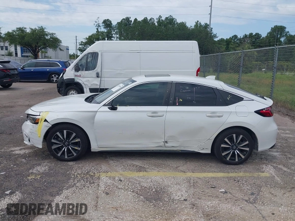 2023 Honda Civic EX-L with VIN 19XFL1H70PE014510, listed as a IAAI auction lot 42395890 with 14,163 mi miles and . Bid and sale history available at DreamBid. Image 14.