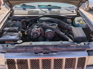 1998 Jeep Grand Cherokee Limited z VIN 1J4GZ88Z8WC306919, wystawiony jako Copart lot #61505725 z przebiegiem 195 329 mil mil oraz Czysty tytuł • Clean title. Historia ofert i sprzedaży dostępna na DreamBid. Obrazek 11.