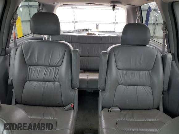 2004 Honda Odyssey EX-L with VIN 5FNRL18044B069774, listed as a Copart auction lot 57096535 with 165,307 mi miles and Salvage title. Bid and sale history available at DreamBid. Image 10.