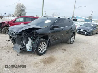 2015 Jeep Cherokee Latitude with VIN 1C4PJMCB6FW527448, listed as a IAAI auction lot 42074461 with 139,795 mi miles and . Bid and sale history available at carsss.com. Image 2.