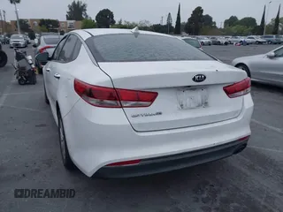 2017 Kia Optima LX with VIN 5XXGT4L37HG151723, listed as a IAAI auction lot 42024328 with 102,257 mi miles and . Bid and sale history available at DreamBid. Image 3.