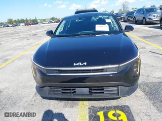 2025 Kia K4 LXS with VIN 3KPFT4DE5SE058209, listed as a IAAI auction lot 41908764 with 129 mi miles. Bid and sale history available at carsss.com. Image 12.