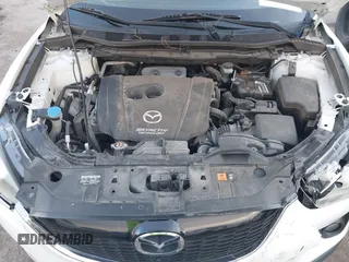 2014 Mazda CX-5 Touring with VIN JM3KE2CY8E0321578, listed as a IAAI auction lot 41769930 with 101,724 mi miles. Bid and sale history available at carsss.com. Image 10.