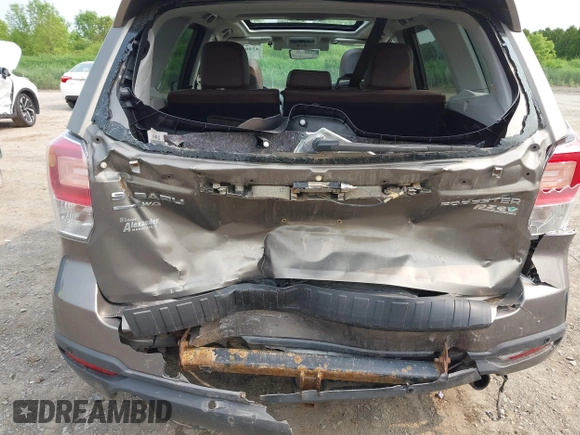 2017 Subaru Forester Touring z VIN JF2SJAWC6HH529707, wystawiony jako IAAI lot #42401138 z przebiegiem 172 868 mil mil oraz . Historia ofert i sprzedaży dostępna na DreamBid. Obrazek 6.
