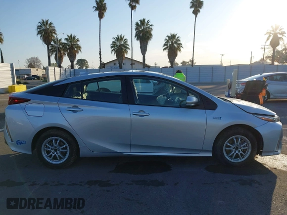 2021 Toyota Prius LE with VIN JTDKAMFP1M3196066, listed as a IAAI auction lot 41752179 with 90,200 mi miles and . Bid and sale history available at DreamBid. Image 14.